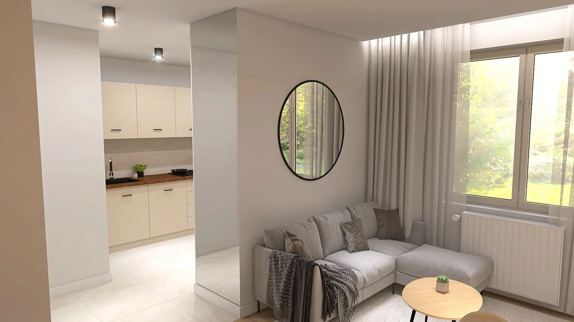 Projektowanie wnętrz Olsztyn. Nowoczesny salon z szarą sofą, okrągłym lustrem w czarnej ramie na ścianie i widoczną w tle kuchnią